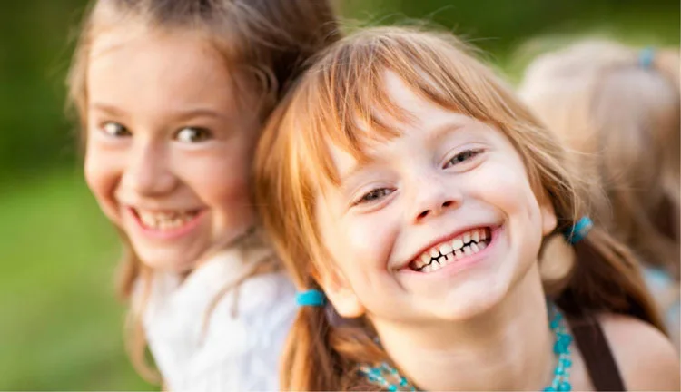 Two kids smiling